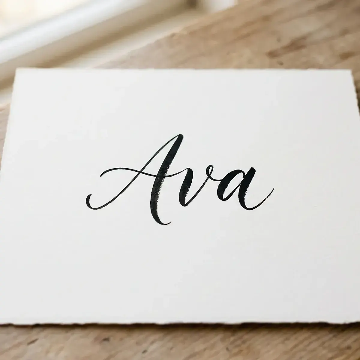 The name Ava in elegant calligraphy