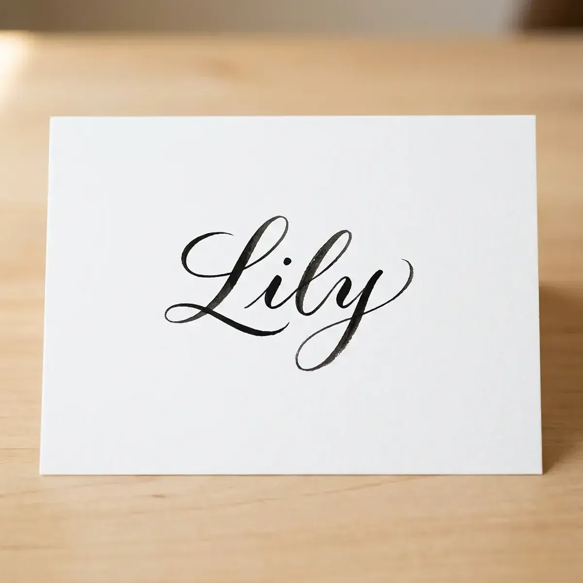 The name Lily in elegant calligraphy