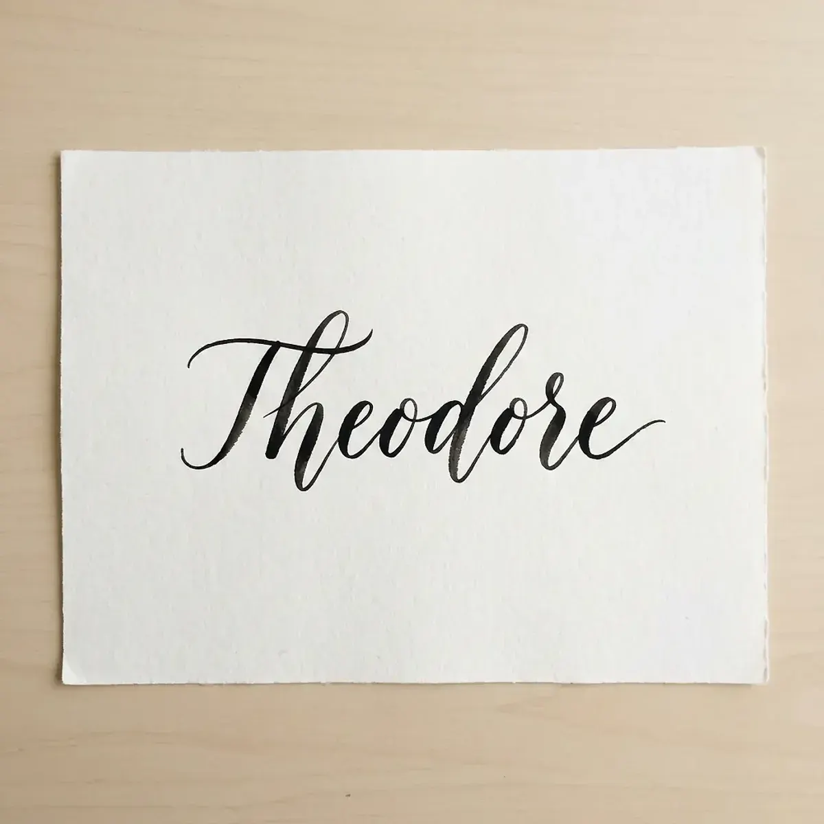 The name Theodore in elegant calligraphy
